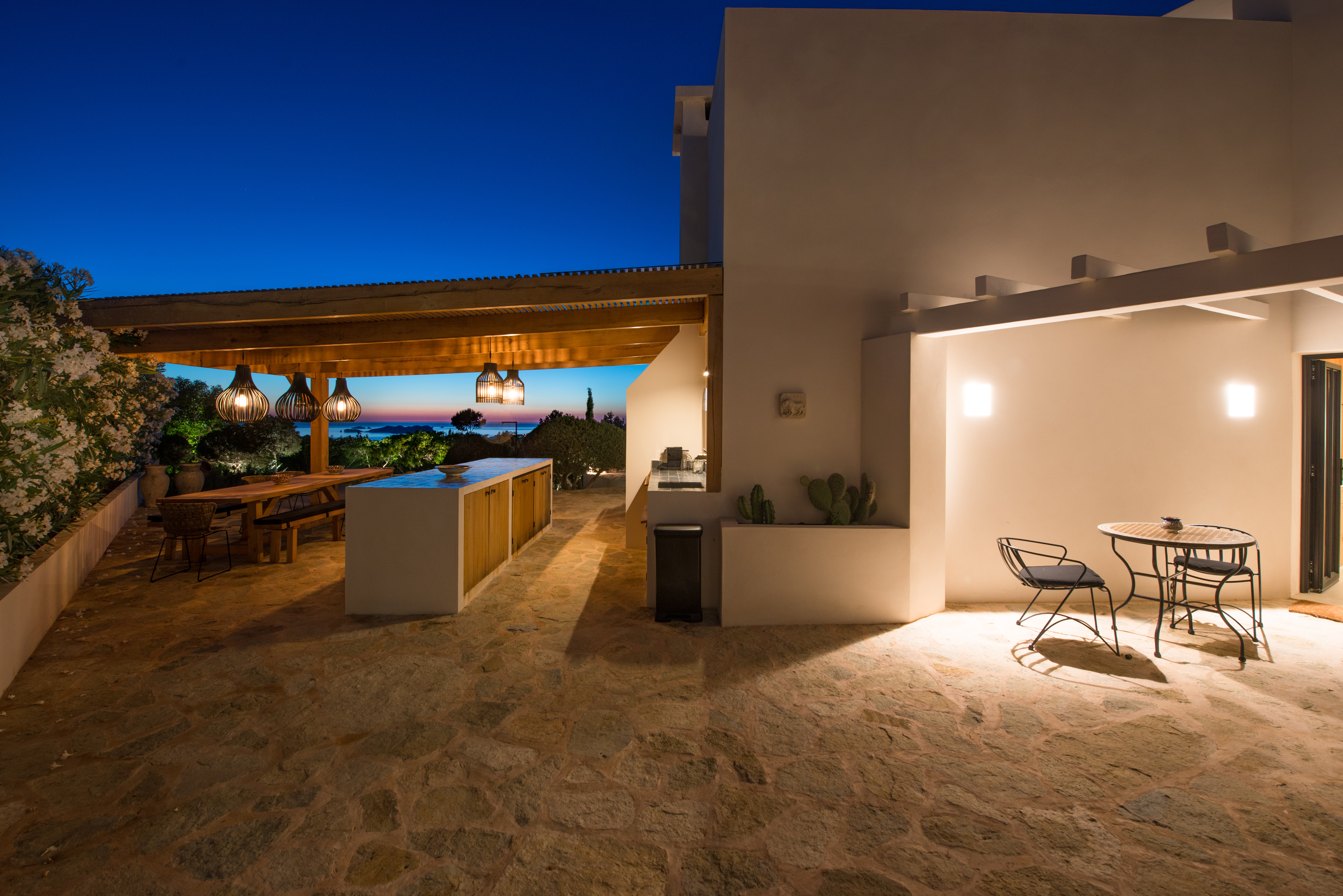 Resa estates ibiza luxury home for sale cala tarida tourise license night outdoor kitchen.jpg